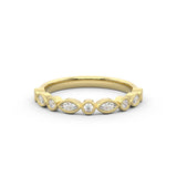 alternating round and marquise diamond ring with a millgrain edge finish
