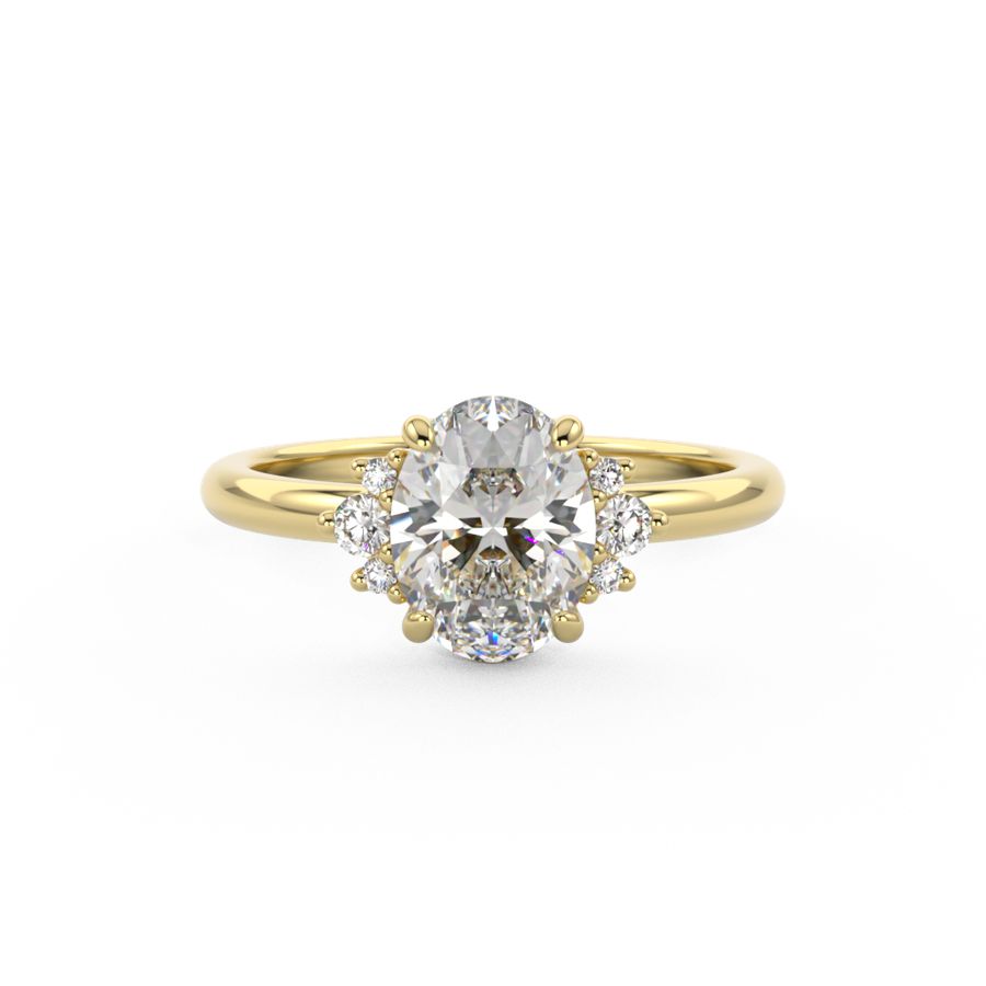 Oval Engagement ring with diamond halo featuring graduating diamonds in a yellow gold band