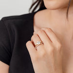 baguette and round diamond wedding ring with oval three stone engagement ring