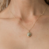  bead chain necklace with gold oval pendant
