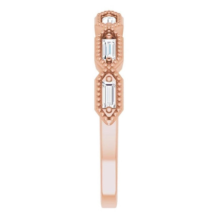rose gold diamond eternity ring with baguette cut diamonds and millgrain edge