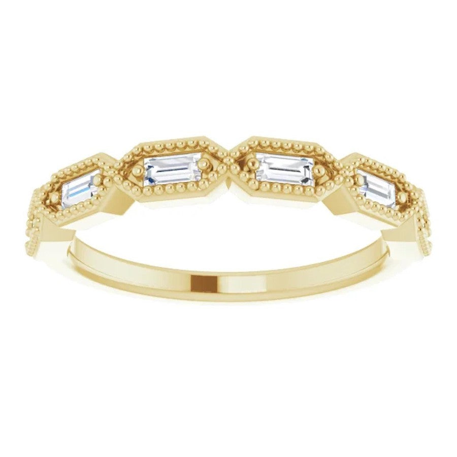 yellow gold diamond wedding ring with baguette cut diamonds and millgrain edge