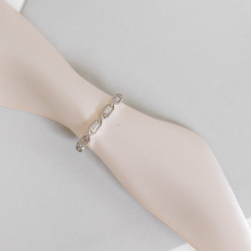 baguette shaped diamond ring with millgrain edge