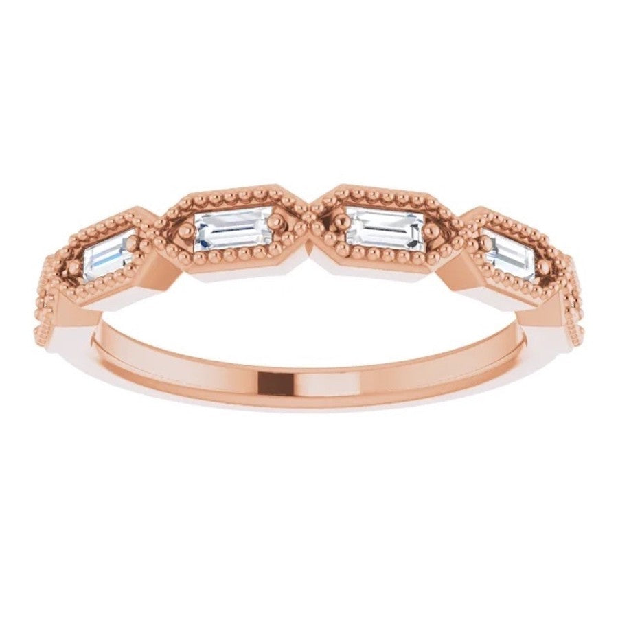 rose gold diamond wedding ring with baguette cut diamonds and millgrain edge