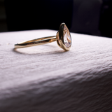 bezel pear cut diamond ring