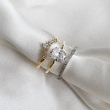 yellow gold oval engagement ring with diamond crown ring and diamond band