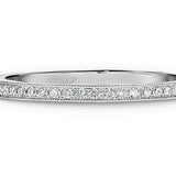 white gold diamond ring with millgrain edge