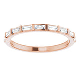 rose gold eternity ring with baguette cut diamonds