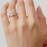 chunky gold wedding ring with oval engagement ring