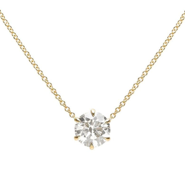 yellow gold claw set diamond pendant