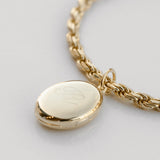 gold oval locket engraved with rope chain necklace