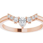 rose gold graduated crown ring with pear centre stone