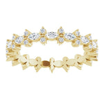 yellow gold diamond wedding ring with marquise diamonds and round diamonds