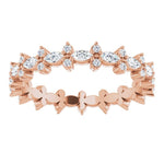 rose gold diamond eternity ring with marquise diamonds and round diamonds