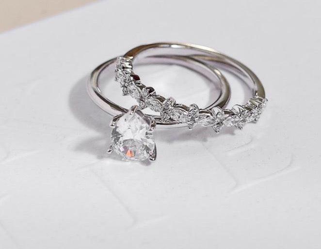 White Gold Pear solitaire engagement ring with white gold diamond wedding ring