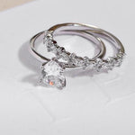 White Gold Pear solitaire engagement ring with white gold diamond wedding ring