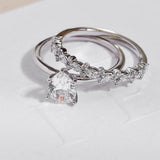 White Gold Pear solitaire engagement ring with white gold diamond wedding ring