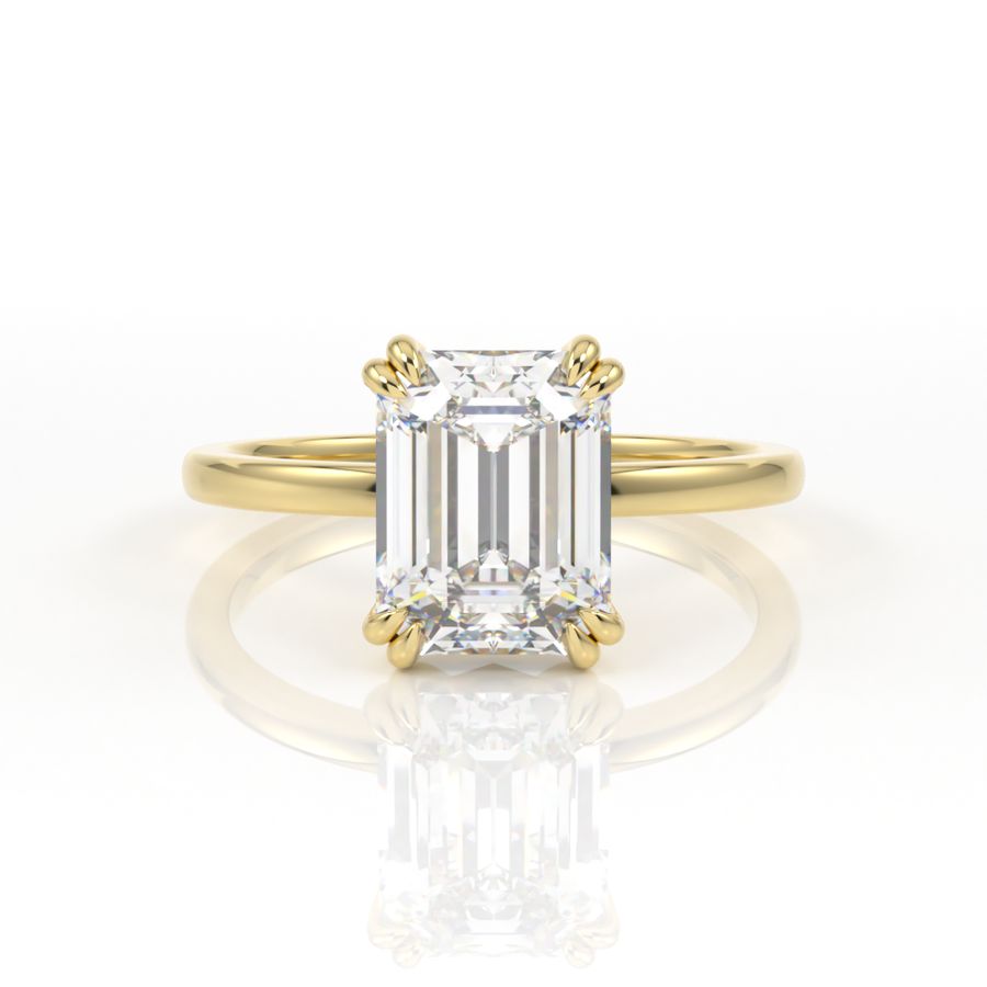 Double claw solitaire engagement ring with emerald cut diamond centre
