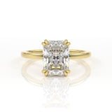 Double claw solitaire engagement ring with radiant cut diamond centre