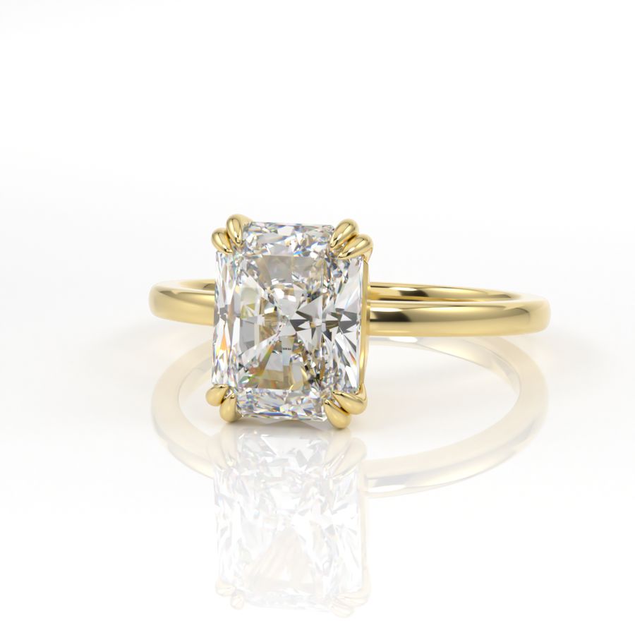 Double claw solitaire engagement ring with radiant cut diamond centre
