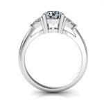 white gold 3 stone diamond engagement ring with a round centre stone and trilliant triangle shape side stones