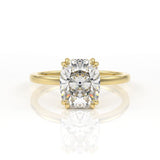 Elongated cushion cut diamond solitaire engagement ring with double claws