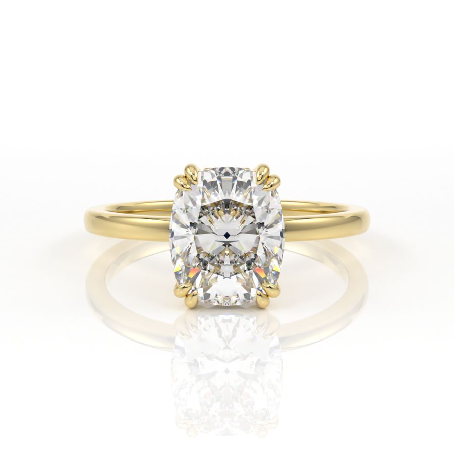 Elongated cushion cut diamond solitaire engagement ring with double claws