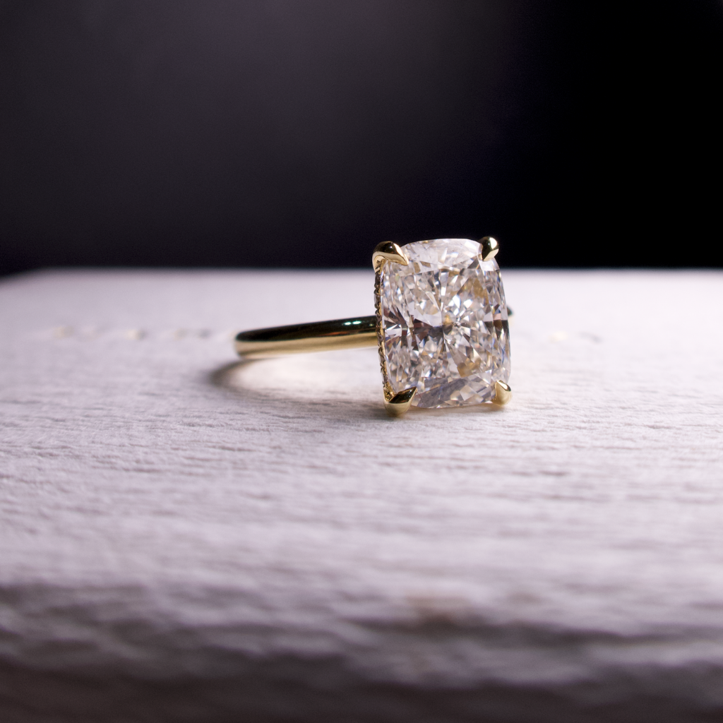 elongated cushion diamond with hidden halo