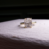 elongated solitair cushion cut with hidden halo
