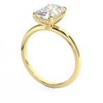 emerald cut diamond solitaire engagement ring with hidden halo in yellow gold