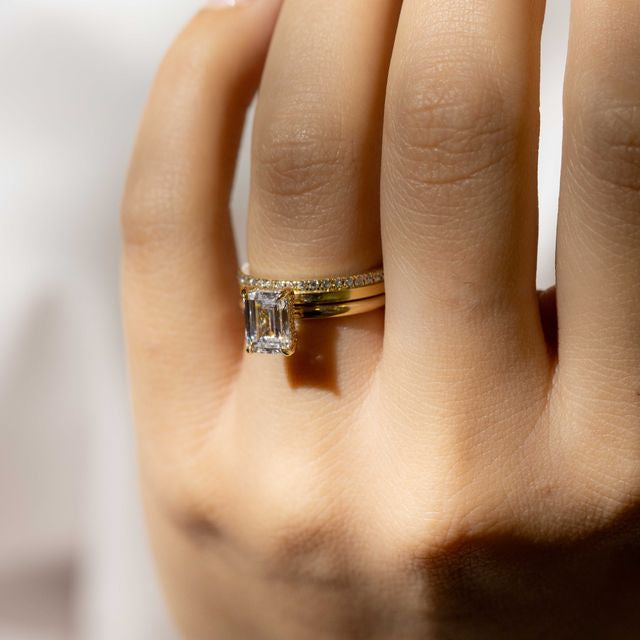 emerald cut diamond with hidden halo