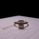 emerald cut half bezel 