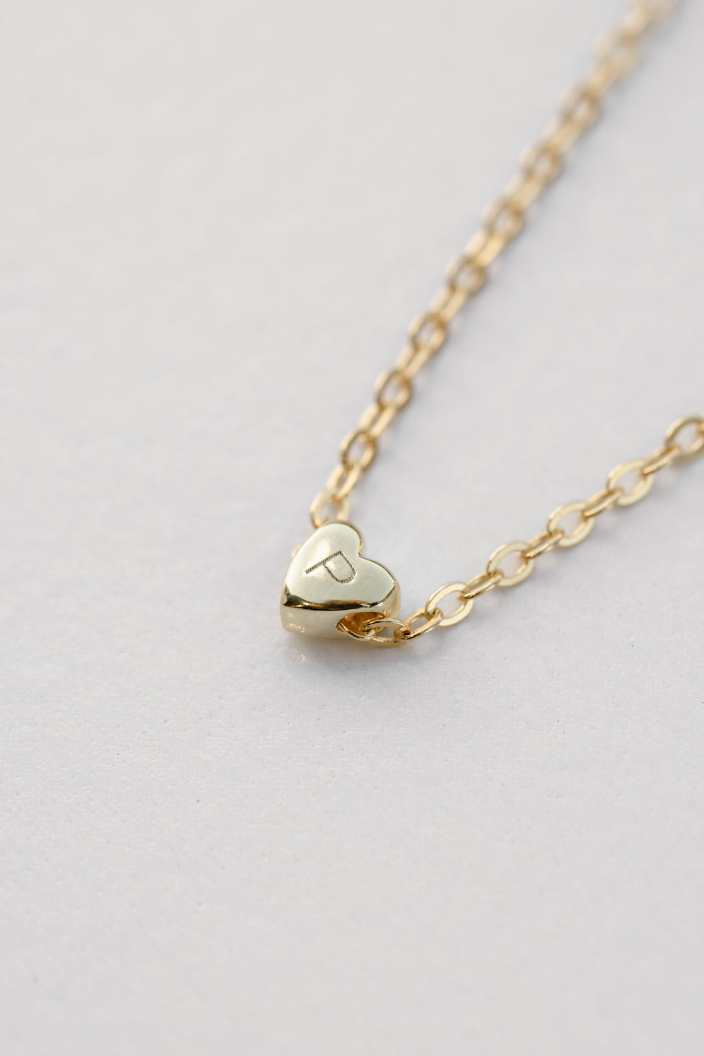 engraved tiny heart pendant