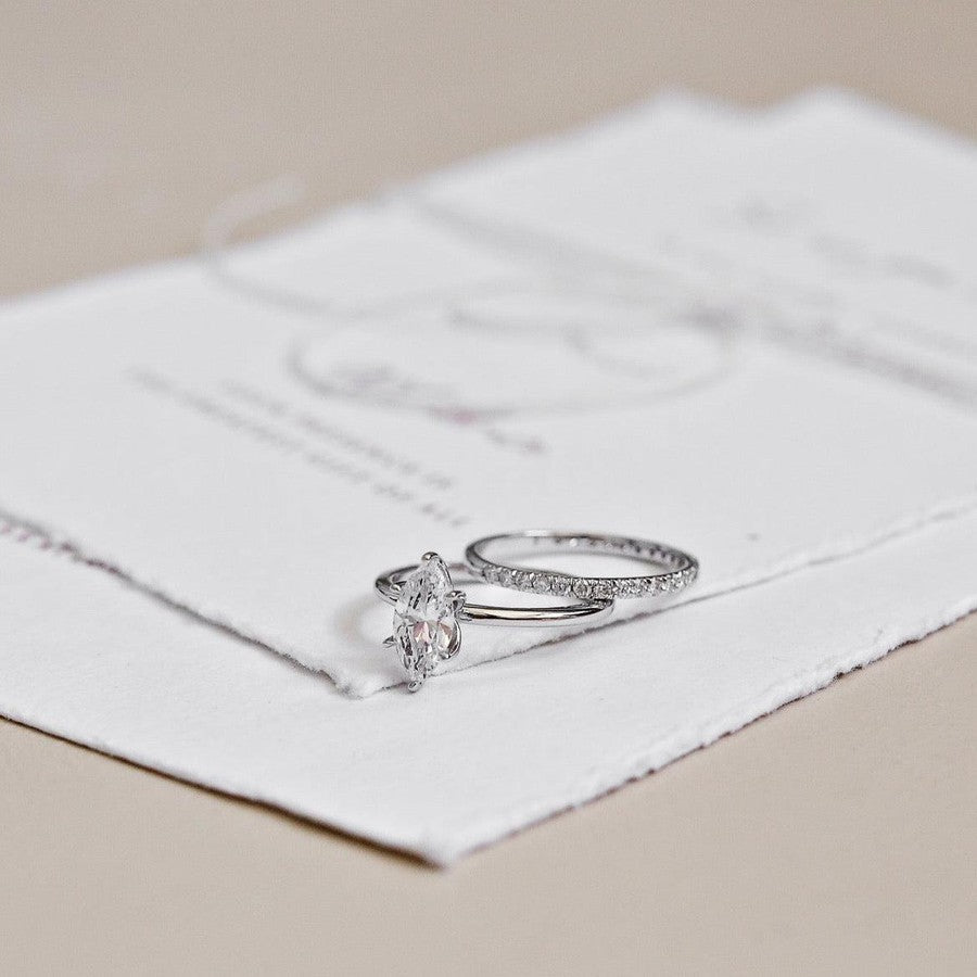White Gold diamond wedding ring and white gold marquise shape diamond ring