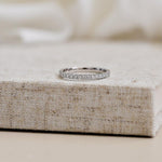 eternal claw set diamonds with a sweeping scallop setting in platinum 