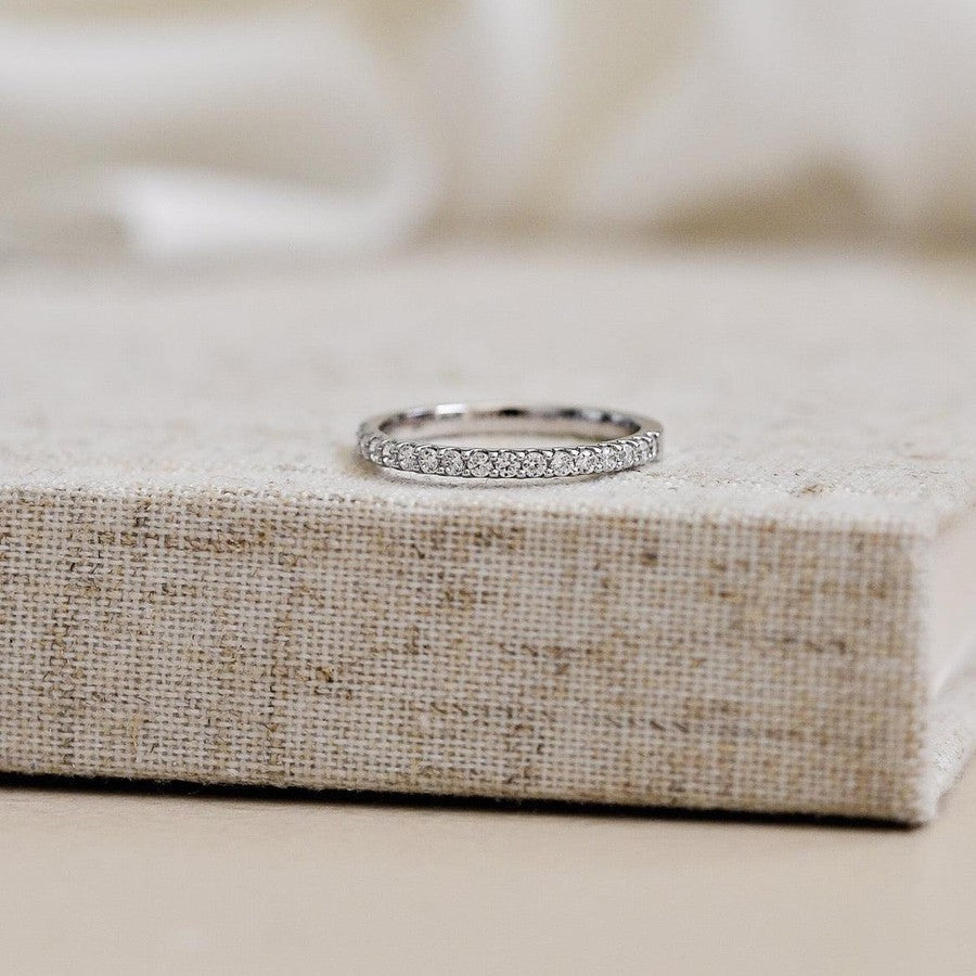 eternal claw set diamonds with a sweeping scallop setting in platinum 
