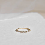 Yellow gold diamond ring with marquise diamonds and round diamonds