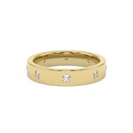 Flat profile pressure set diamond wedding ring.