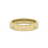 Flat profile pressure set diamond wedding ring.