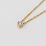 gold bezel set diamond necklace