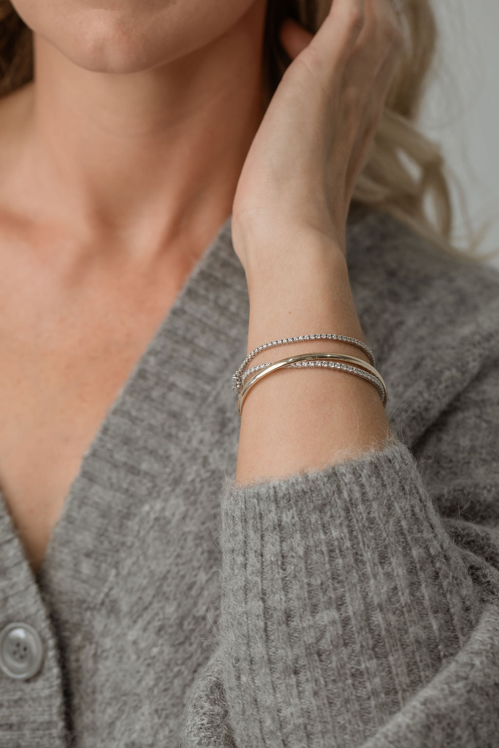 gold round bangle with tennis bracelet