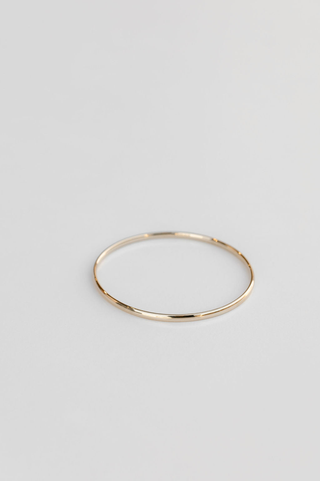 thin oval gold bangle