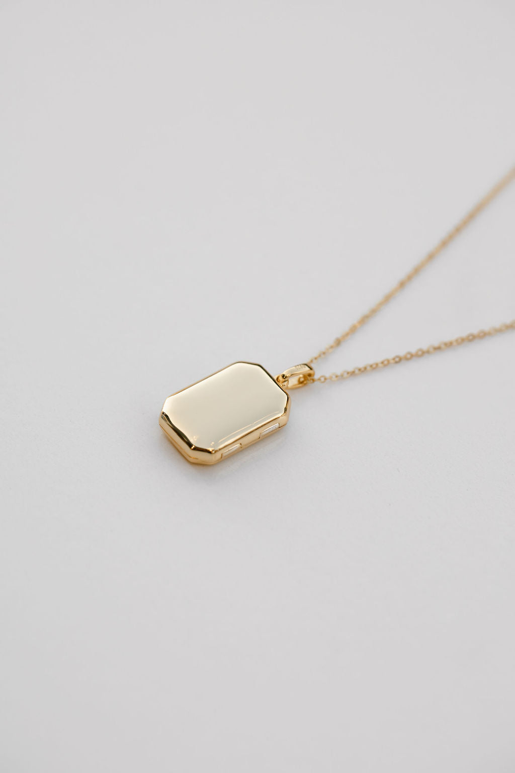 rectangular bevel gold locket on plain chain