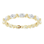 yellow gold diamond wedding ring with marquise diamonds
