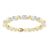 yellow gold diamond wedding ring with marquise diamonds