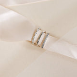 marquise shape diamond ring, plain white gold wedding ring, diamond wedding ring with millgrain edges