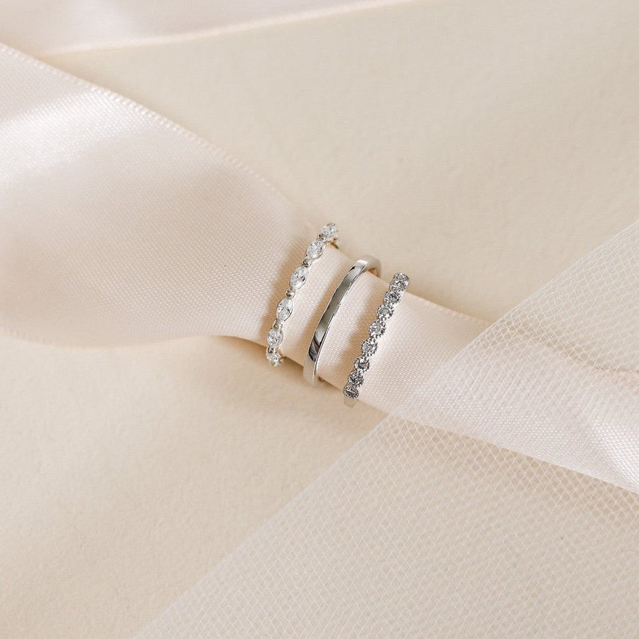 marquise shape diamond ring, plain white gold wedding ring, diamond wedding ring with millgrain edges