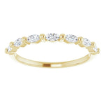 yellow gold diamond eternity ring with marquise diamonds