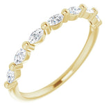 yellow gold diamond wedding ring with marquise diamonds