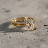 Graduated Crown Ring - a curved diamond ring with diamonds graduating from bigger to smaller